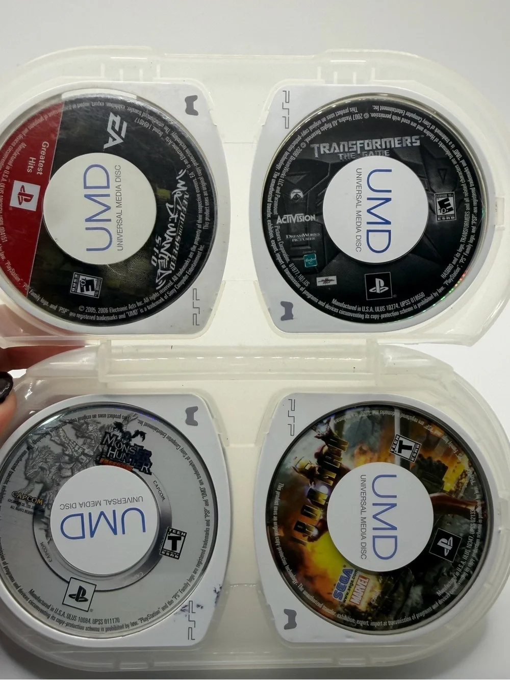 Sony PSP UMD Disc 8-Pack in Clear White Case (7 games, 1 movie)